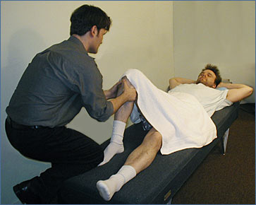 Los Angeles, West Hollywood, Beverly Hills Chiropractor Dr. Nick Campos treating a sports injury